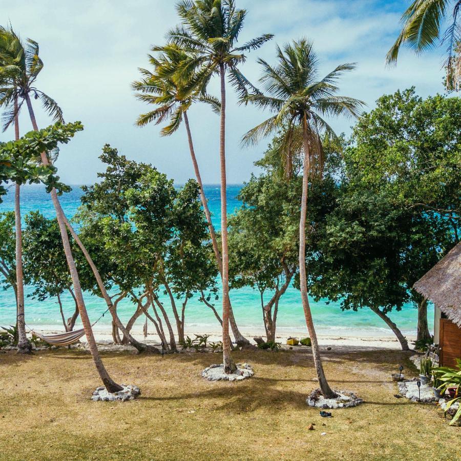 Whispering Palms - Absolute Beachfront Villas Порт-Віла Екстер'єр фото